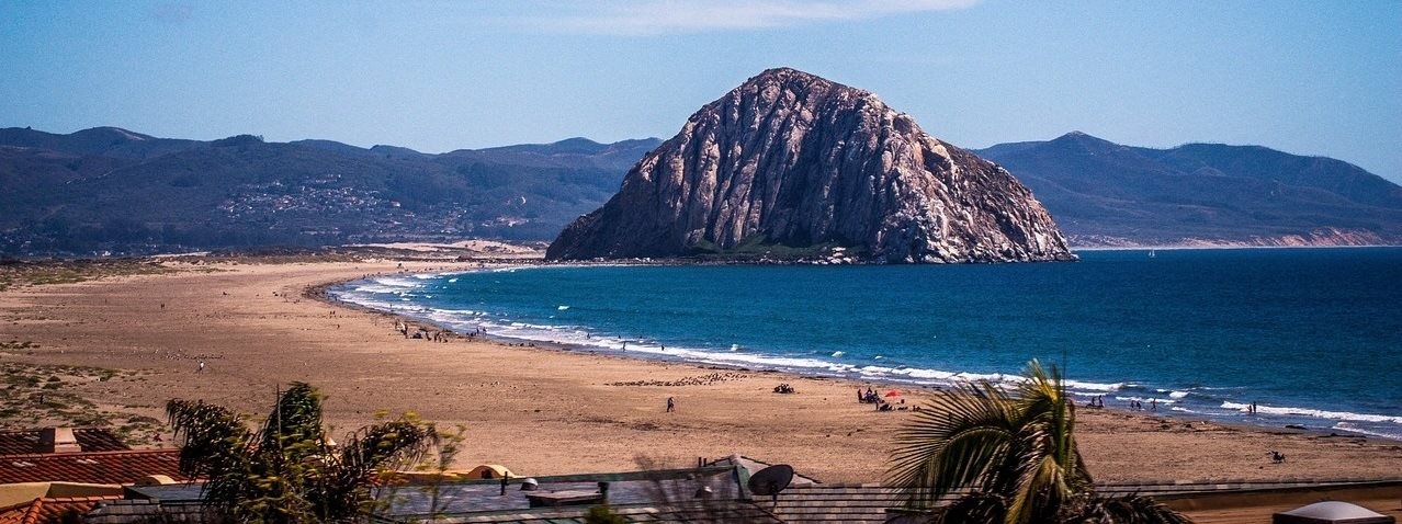 a view of the haystack rock in canon beach